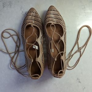 Nude lace up flats